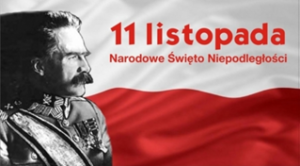 Józef Piłsudski na tle biało-czerwonej flagi